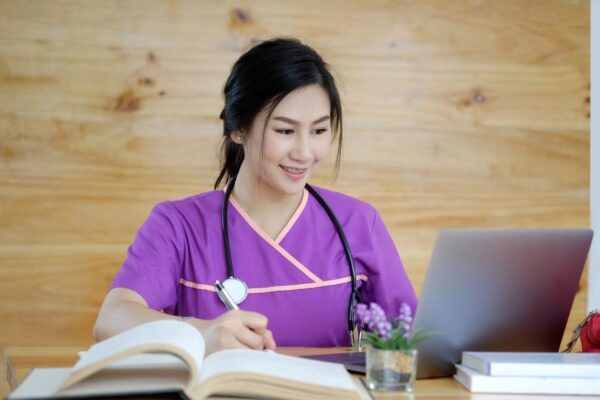 nurse in a purple uniform